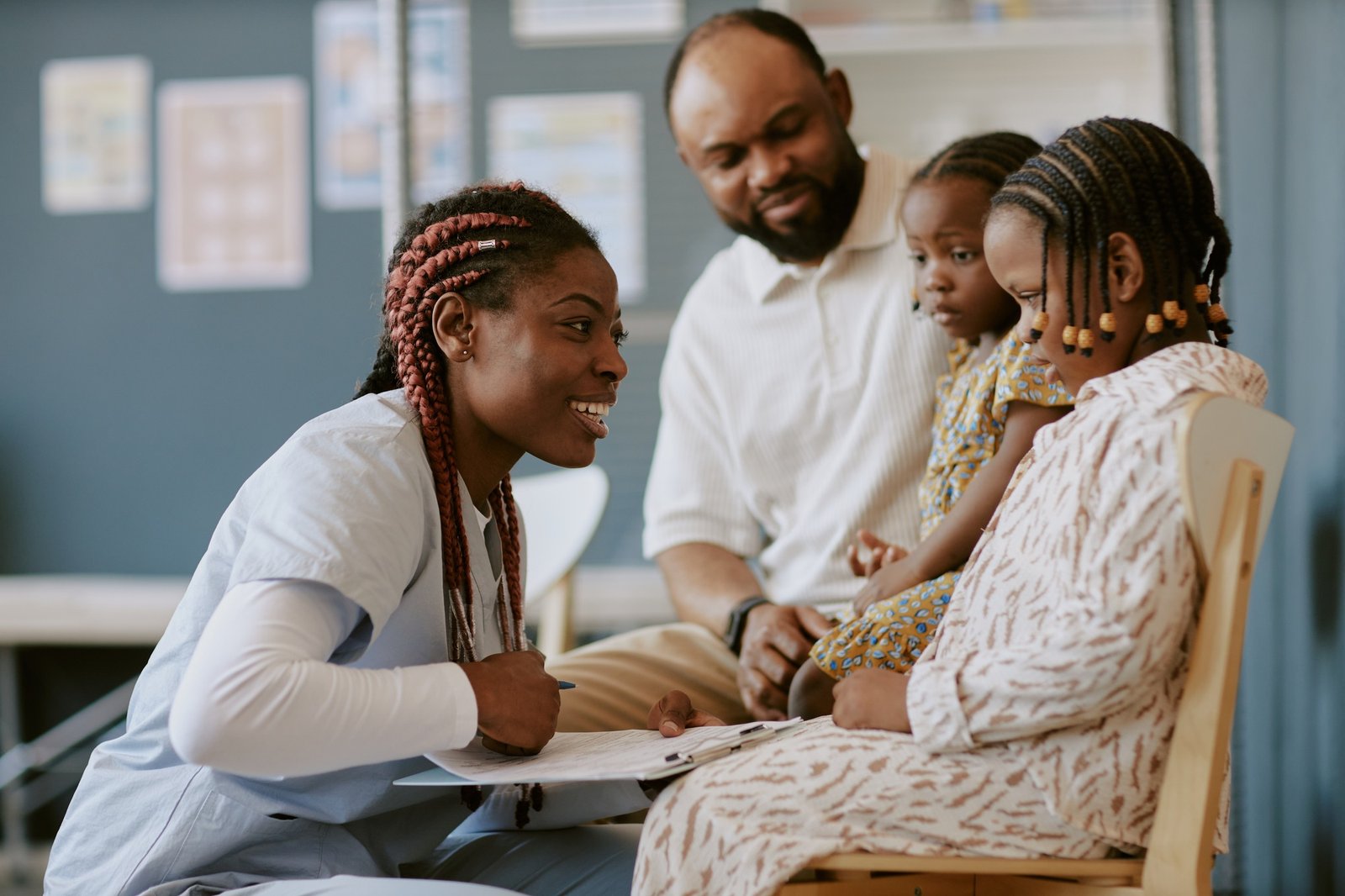 Caring Medical Professional Interacting with Family Members
